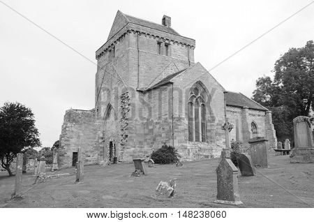 A view across a graveyard at Crichton collegiate church