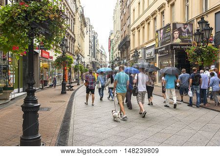 BUDAPEST, SEPTEMBER 17: Vaci street with tourists on September 17, 2016 in Budapest, Hungary. On Vaci street in Budapest has collected a huge number of shops, boutiques, cafes and restaurants.