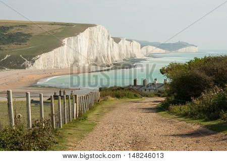 View towards the Seven Sisters chalk cliffs and Beachy Head from Seaford Head. East Sussex England