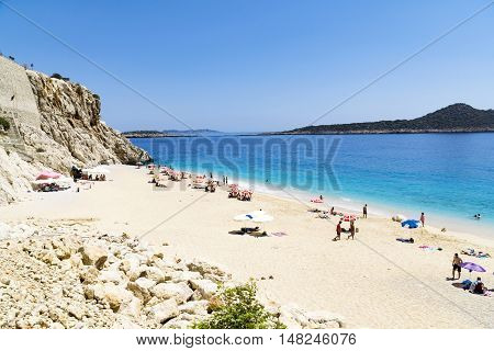 TURKEY KAPUTAS BEACH - MAY 29: Tourists on famous Kaputas beach near Kas city on May 29 2016 in Turkey