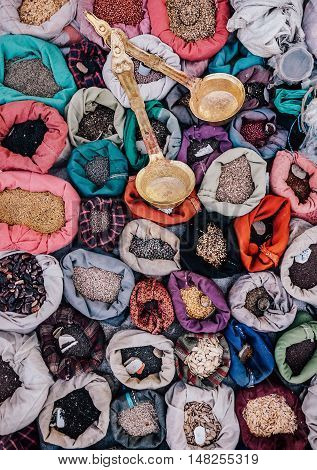 Indian spices in little sacks in the market (Leh, Ladakh, India)