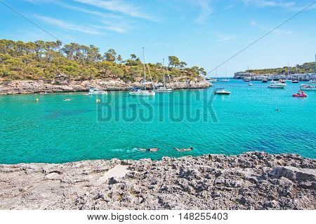 Couple Snorkeling In Clear Turquoise Water