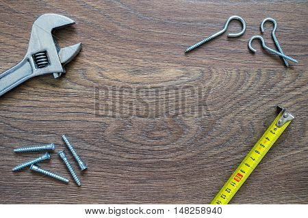 Different Tools On A Wooden Background. Fathers Day Card.