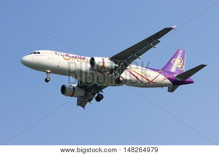 CHIANGMAI, THAILAND -JANUARY 7 2013: HS-TXC Airbus A320-200 of Thaismile airway. Landing to Chiangmai airport from Bangkok Suvarnabhumi.