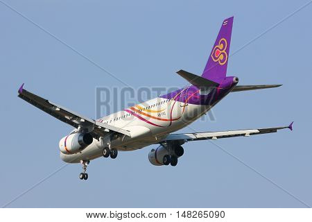CHIANGMAI, THAILAND -JANUARY 7 2013: HS-TXC Airbus A320-200 of Thaismile airway. Landing to Chiangmai airport from Bangkok Suvarnabhumi.