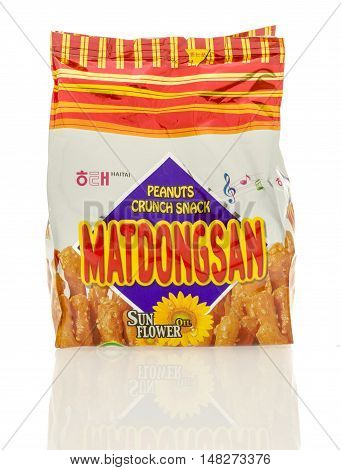 Winneconne WI - 30 August 2016: Bag of Haitai Matdongsan peanuts crunch snack on an isolated background.