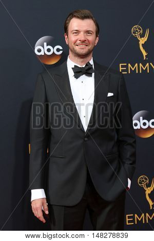 LOS ANGELES - SEP 18:  Costa Ronin at the 2016 Primetime Emmy Awards - Arrivals at the Microsoft Theater on September 18, 2016 in Los Angeles, CA