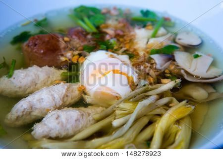 porridge with pork and egg for breakfast