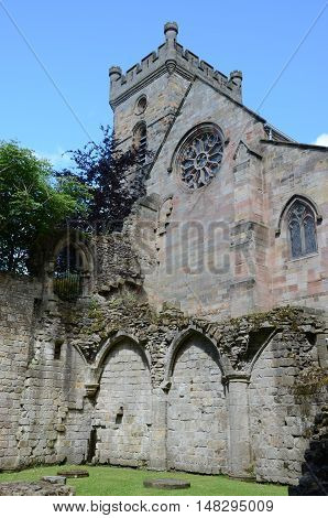 A view of the church in Culross towering above the ruins of the medieval abbey