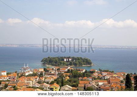 Island Galevac with Franciscan monastery and Croatian town Preko