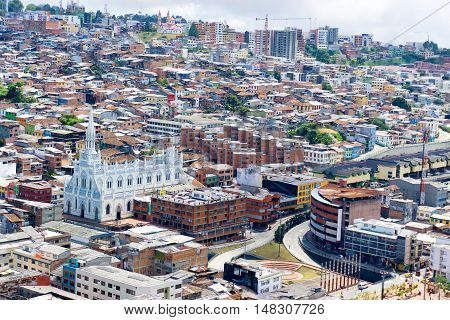 Cityscape and beautiful blue and white church in Manizales Colombia