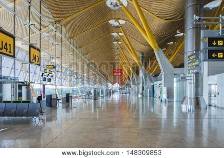 Madrid Spain: 16th July 2016: The Madrid-Barajas Airport is Spain's largest and busiest airport characterised by a floating roof propped by an internal coloured structure.
