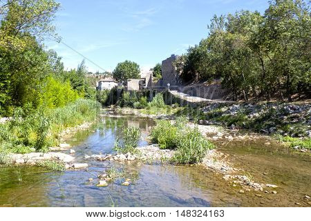 Lagrasse Village Near The River In Summer In France