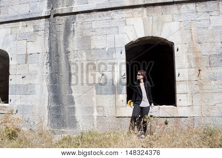 Girl Sit In A Window Of The Canfranc Fort In Spain