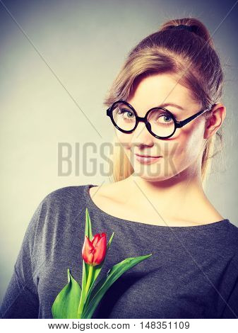 Beauty Woman With Tulip Flower.