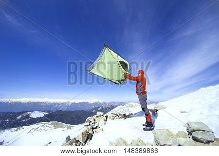 Camping on the top of the mountain in winter.