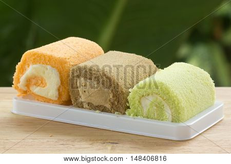 Three flavors jam rool cake on the tray
