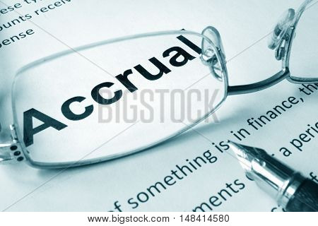 Paper with sign Accrual and a pen. Business concept.