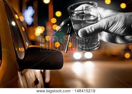 hard drinker with liqueur glass by night