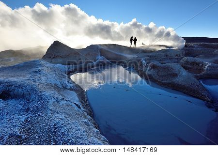 Steaming hot water ponds and mud pots in geothermal region of the Andean Highlands of Bolivia