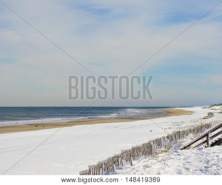 Atlantic ocean waves on the beach at Hamptons, Long Island, New York, Suffolk County in Winter, 2016