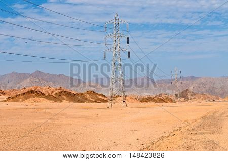 Desert power line and electricity pylons - Egypt