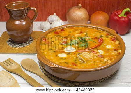 white beans with clams and vegetables on the table