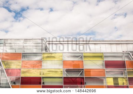 facade of a modern shopping center, colorful window