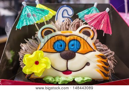 beautiful birthday cake with cream, baked design in the form of an animal hedgehog