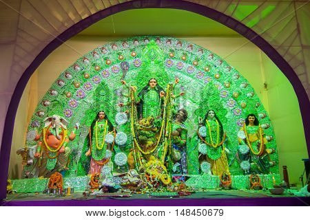 KOLKATA INDIA - OCTOBER 21 2015 : Beautiful interior of decorated Durga Puja pandal at Kolkata West Bengal India. Durga Puja is biggest religious festival of Hinduism.