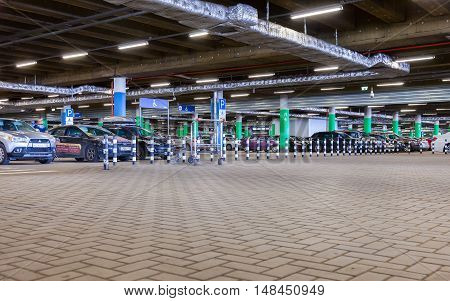 ST. PETERSBURG RUSSIA - JULY 28 2016: Underground car parking Mega shopping mall