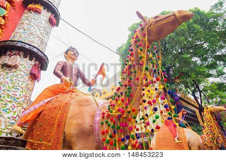 KOLKATA INDIA - OCTOBER 21 2015 : Beautiful exterior of decorated Durga Puja pandal at Kolkata West Bengal India. Durga Puja is biggest religious festival of Hinduism.