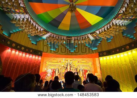 KOLKATA INDIA - OCTOBER 21 2015 : Beautiful interior of decorated Durga Puja pandal at Kolkata West Bengal India. Durga Puja is biggest religious festival of Hinduism.
