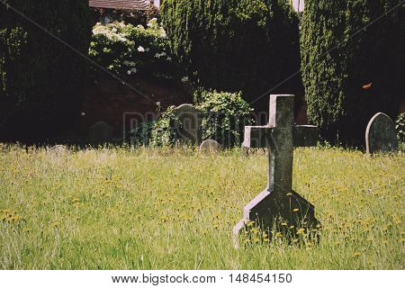 Grave Stones Outside A Church In Beaconsfield, Buckinghamshire, England Vintage Retro Filter.