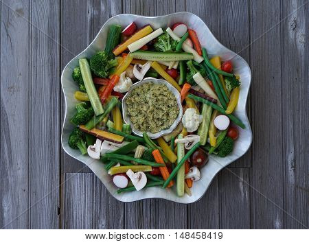 Vegetable Crudites and Dip/ vegetable platter on wood background, healthy eating, top view, selective focus