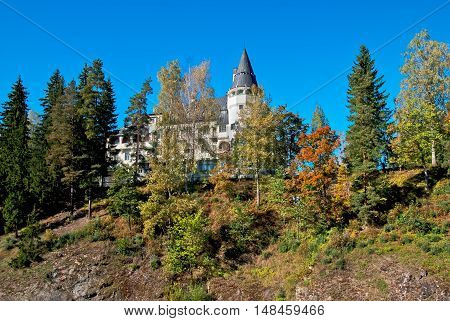 IMATRA, FINLAND - SEPTEMBER 13, 2016: Spa Hotel Rantasipi Imatran Valtionhotelli. Was built in 1903 and designed by the Art Nouveau castle. Canyon of The Imatrankoski Rapids on Vuoksi River