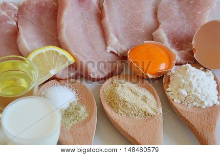 all ingredients on table for make pork schnitzel