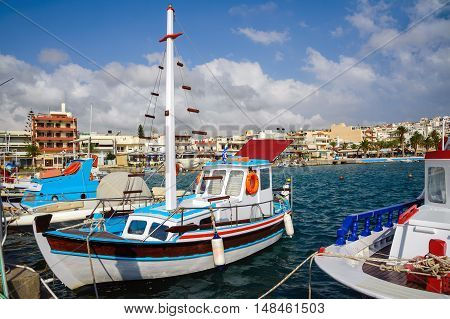 Traditional Greek fishing boat at port of Sitia town at eastern part of Crete island, Greece