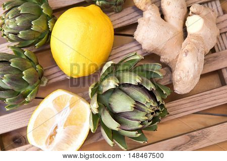 Ripe Organic Artichokes On The Wooden Lattice