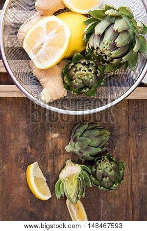 Ripe Organic Artichokes On The Wooden Lattice