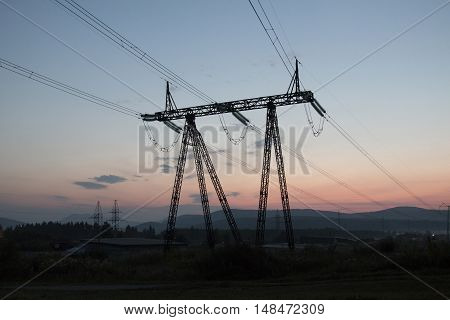 Support power lines in the background of the morning sky