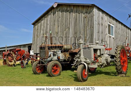 ROLLAG, MINNESOTA, Sept 1. 2016: Restored Twin City, Farmall, and Case tractor are displayed at the West Central Steam Threshers Reunion in Rollag, MN attended by 1000's held annually on Labor Day weekend.