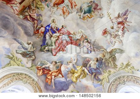 VIENNA AUSTRIA - NOVEMBER 232013: The Karlskirche (St. Charles's Church). Vibrant frescoes of saints and angels decorate the vaulted interior dome of Viennas Karlskirche.