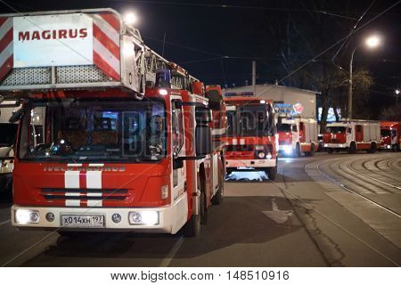 RUSSIA, MOSCOW - FEB 26, 2015: Many fire - engine are standing on the street near Preobrazhenskaya ploshchad subway.