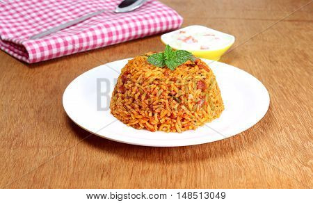 Indian homemade traditional food rice pilaf on a plate.