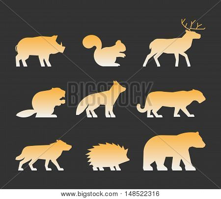 Gold set of figures of wild animals. Silhouettes wild animals isolated on white. Black wild animals. Shape boar squirrels deer beaver fox puma wolf hedgehog and bear.