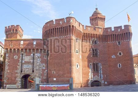 Red Castle With Its Towers In Perpignan, France