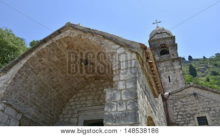 The Our Lady of Remedy church on the hillside above Kotor Montenegro. Built in 1518 the church is part of the popular hiking trail along the town's hillside fotifications