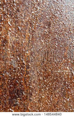 Rough rust texture close up in vertical 3:2 format.
