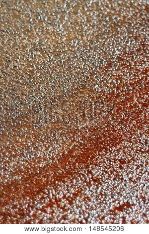 Rough rust texture pattern close up in vertical 3:2 format.